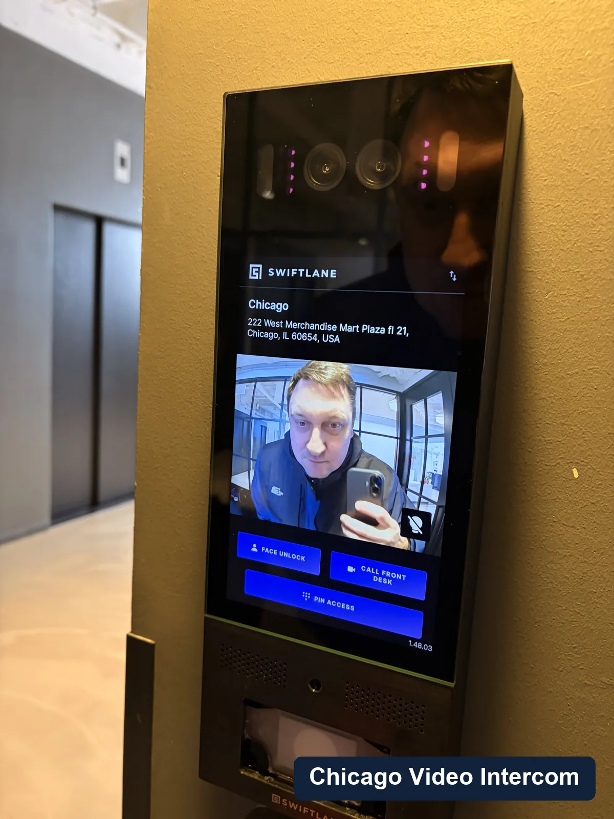 Building entry intercom directory screen in a Chicago lobby