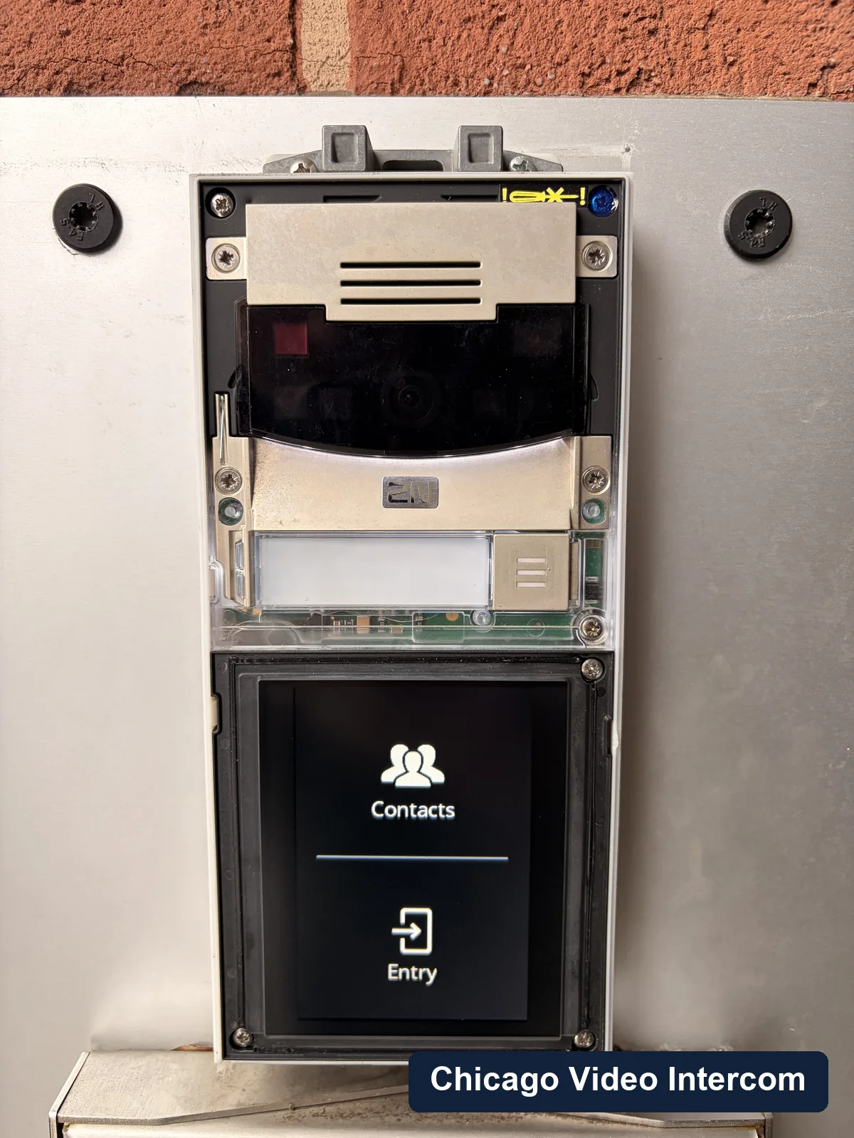 Video entry panel and access reader mounted on Chicago brick