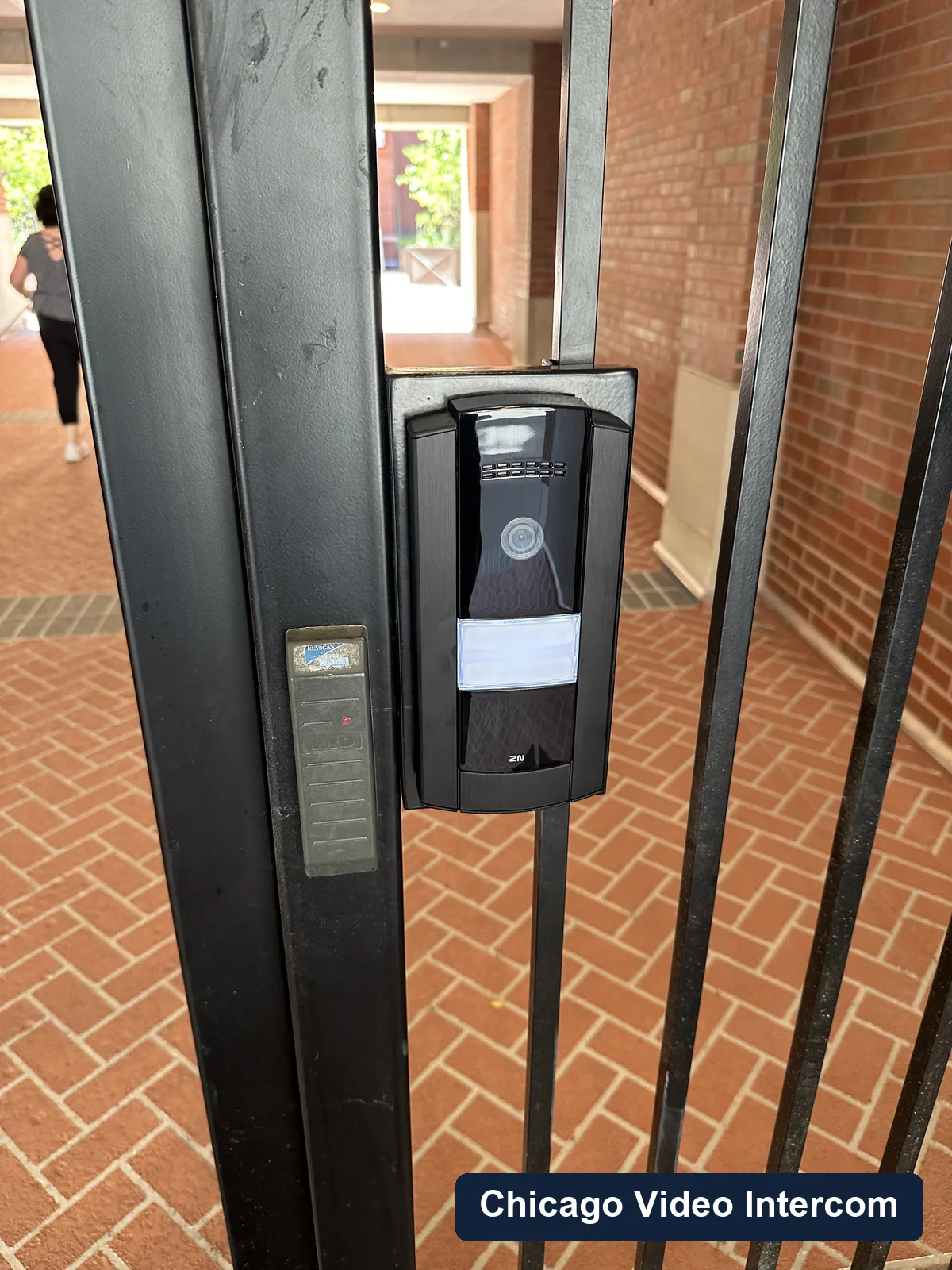 Finished gate video intercom panel mounted at a Chicago property