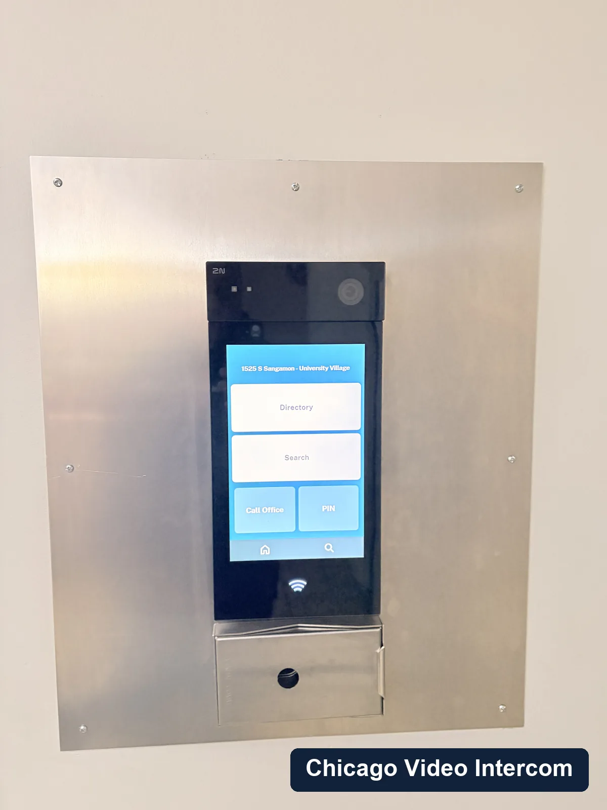 Recessed bright screen video intercom panel in a Chicago lobby
