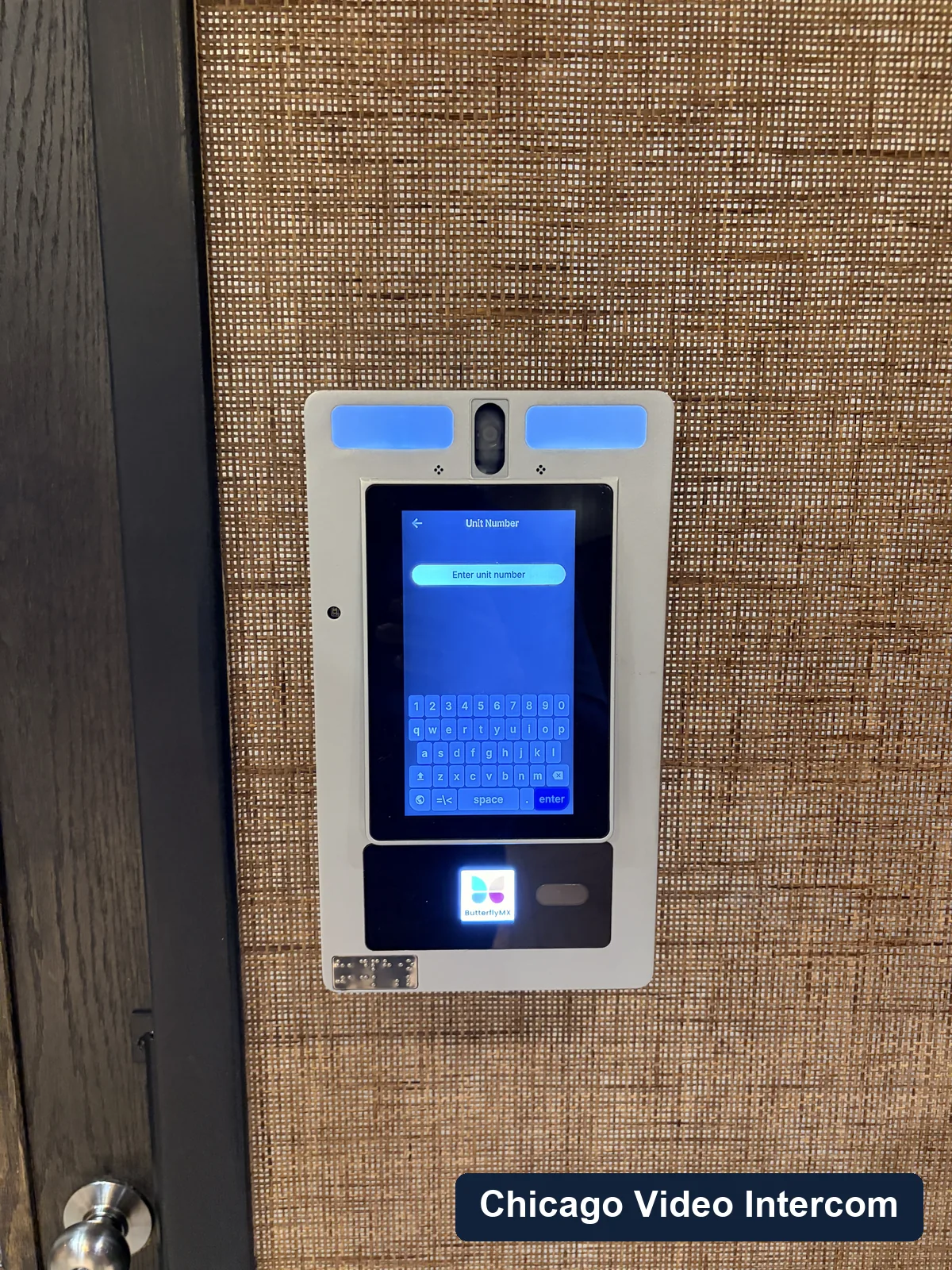 Close-up of a lobby video intercom screen in Chicago