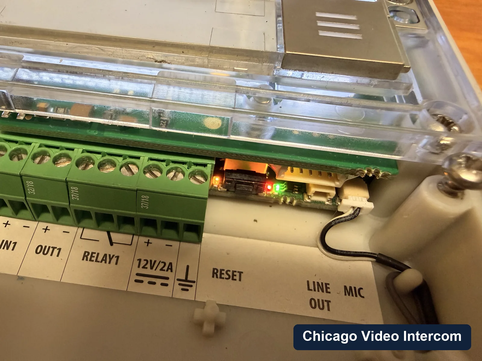 Intercom relay and terminal board close-up during repair work